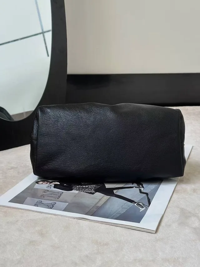 The Row Bourse Clutch Bag