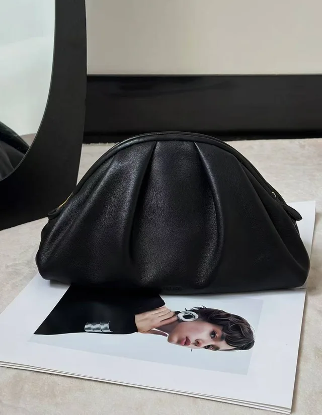 The Row Bourse Clutch Bag